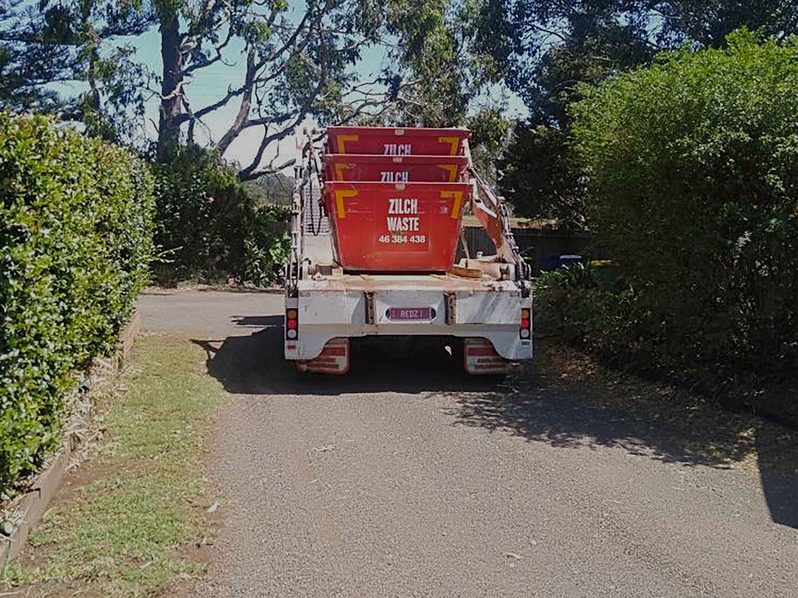 Three-Skip-Bins-on-their-way-darkened-